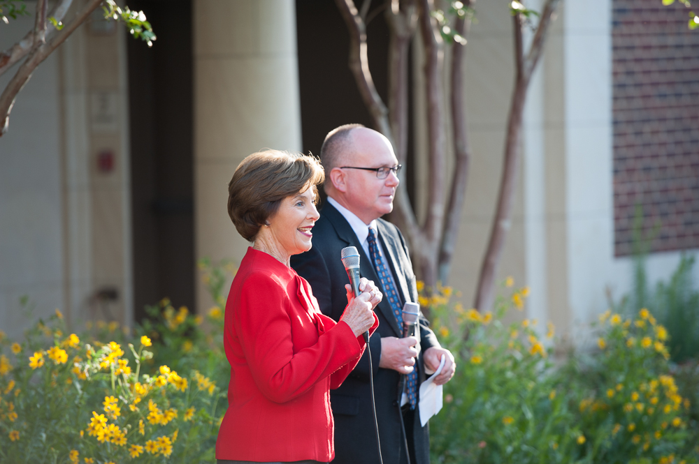 Former First Lady Laura Bush and Alan Lowe, director of the Bush Library, greet reporters in the museum’s re-creation of the White House Rose Garden. Mrs. Bush thanked SMU, her alma mater, for its partnership making possible the new presidential library and museum. 
