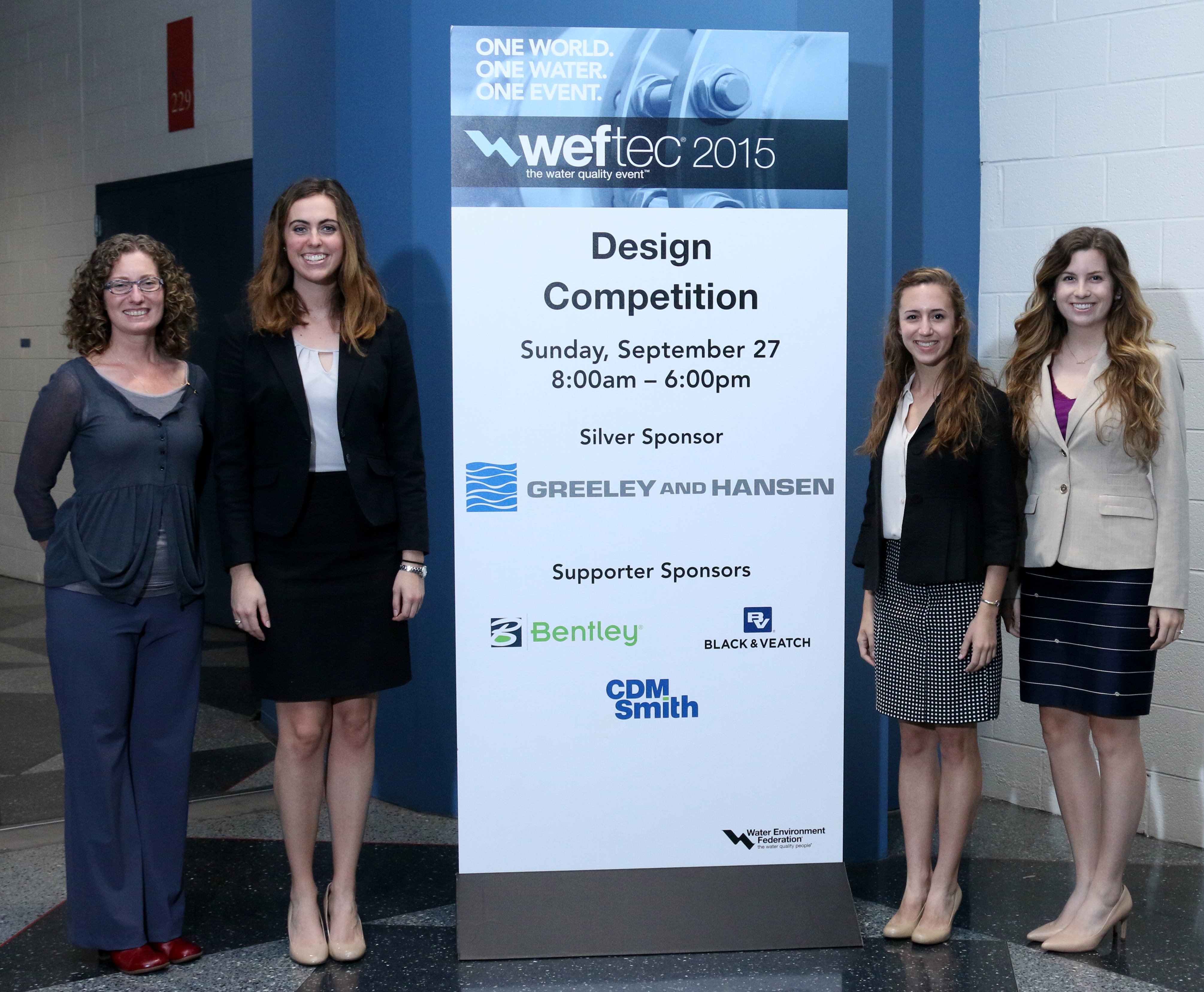 Erin Mosely (WEF Board of Trustees) is the person on the far left.  She made the award presentation to the SMU Team.  The SMU Team from left to right:  Kaylee Dusek, Allison Leopold, and Abigail Klaus.