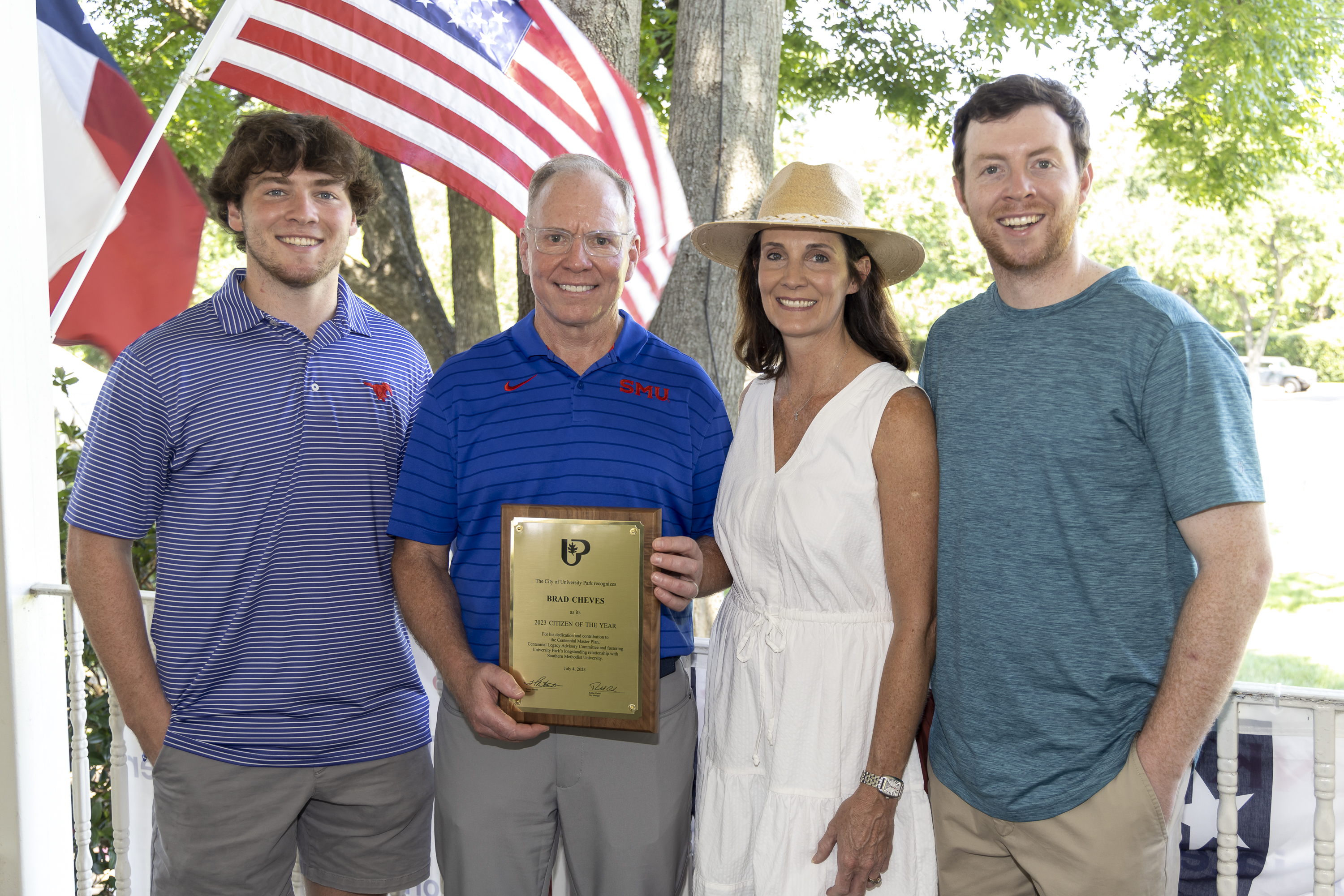 Brad and Angela Cheves, flanked by their sons Keaton, left, and Kyle, right.  Not pictured is their son Conner Cheves.