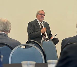 Dean Stone speaking at the luncheon
