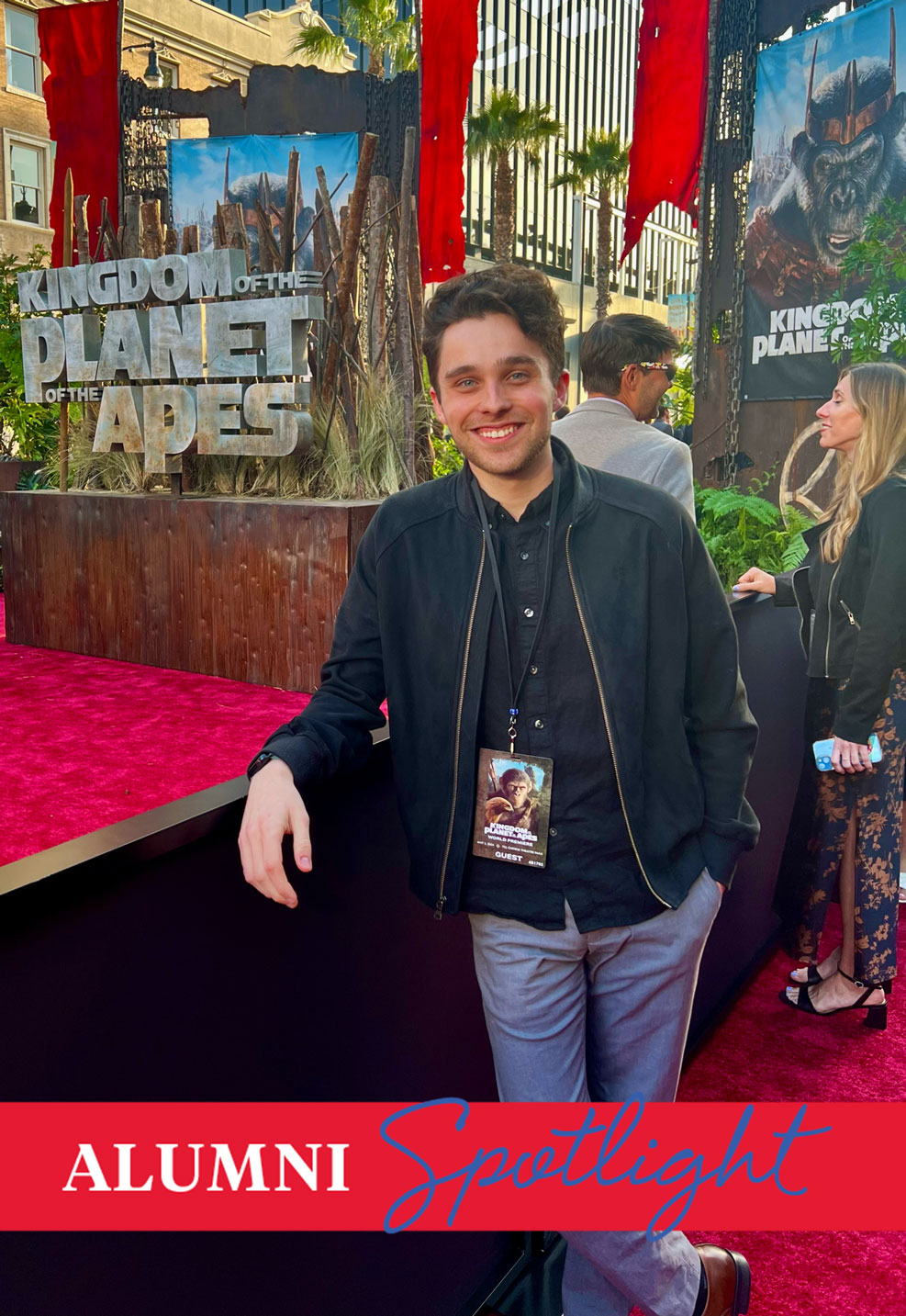 Film & Media Arts alum Cameron Belgrade poses on a red carpet