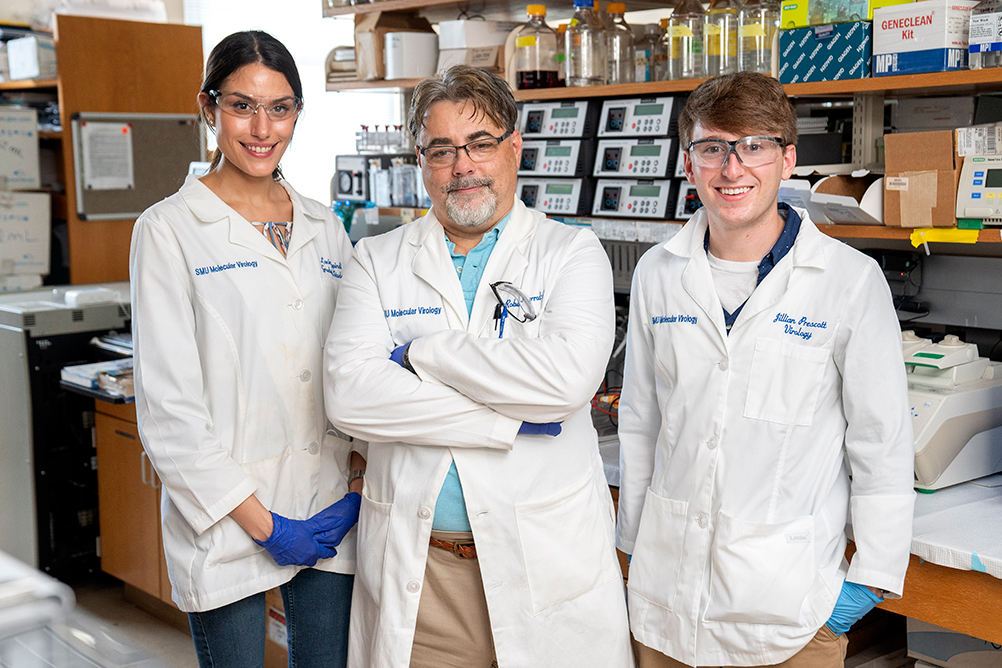 A team of SMU molecular virology researchers in their research laboratory 